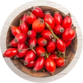Berberine HCl ingredient (illustrative image): red berries in a wooden bowl